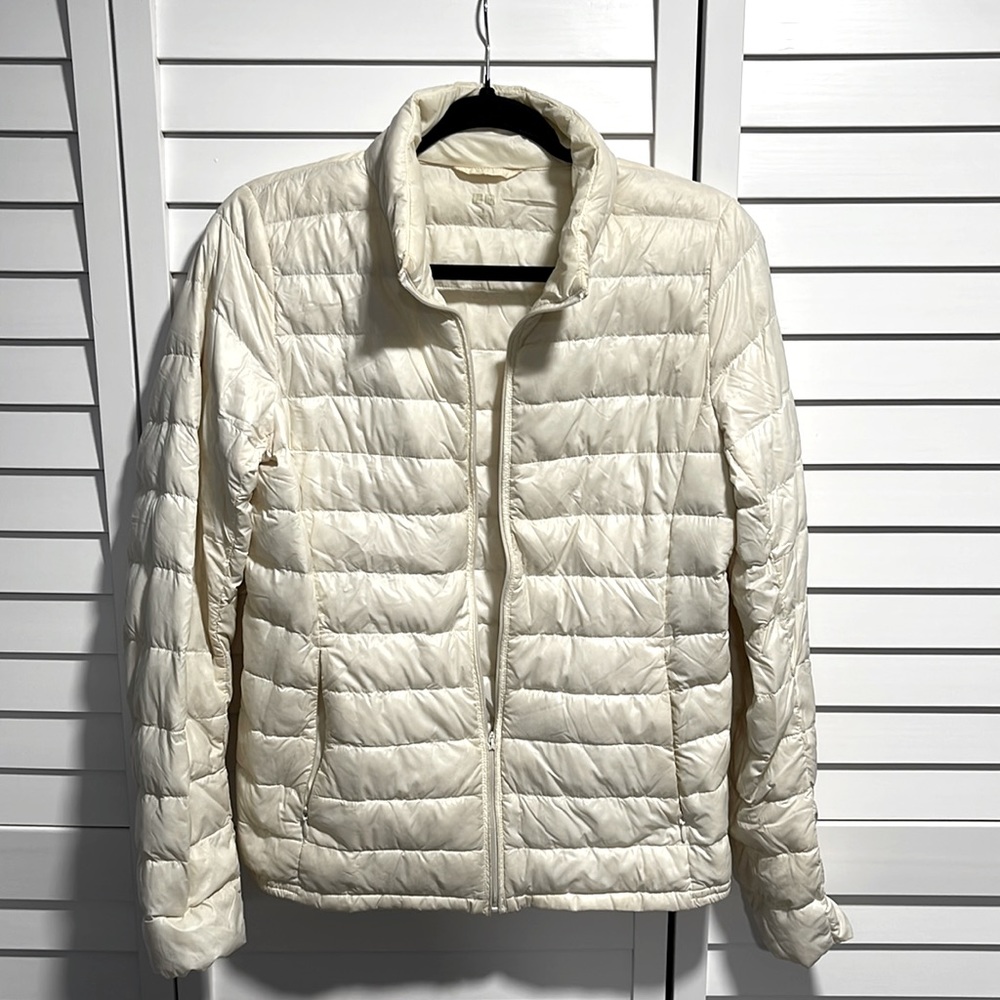 Lightweight jacket has some minimal stains on the neck